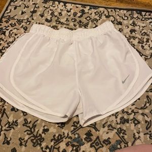 white nike shorts